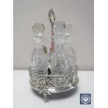 A silver five piece cut crystal cruet set with stand CONDITION REPORT: One glass
