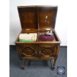 An Apollo gramophone in oak cabinet