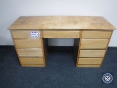 A mid 20th century dressing table fitted nine drawers