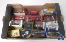 A box containing a collection of die cast vehicles, emergency response vehicles, Dinky,
