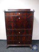 A late 19th century mahogany secretaire chest