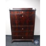 A late 19th century mahogany secretaire chest