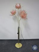 A brass and glass petal floor lamp