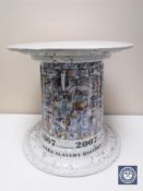 A large ceramic stand, 'Make Slavery History,