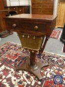 A Regency mahogany work table fitted a drawer,