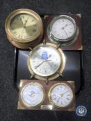 A tray of reproduction marine clocks,
