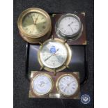 A tray of reproduction marine clocks,