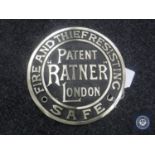 A brass safe plaque 'Ratner Patent,