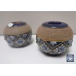 A pair of Royal Doulton glazed stoneware match strikers/pots