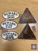 Five metal signs : "BEWARE OF THE DOG", "BEWARE OF THE CAT", "BEWARE OF THE WIFE",