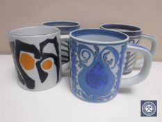 Four Royal Copenhagen Fajence tankards, height 11.