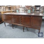 A continental mahogany four door sideboard