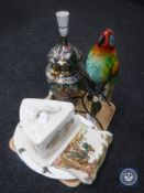 A tray of large butter dish, metal bird, ornate table lamp,