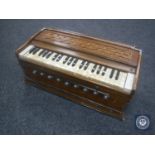 A mid 20th century table top mini organ