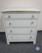 A 20th century painted pine four drawer chest