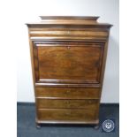 A nineteenth century mahogany secretaire chest