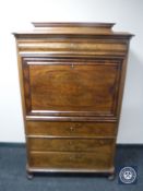 A nineteenth century mahogany secretaire chest