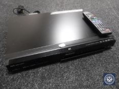 A Panasonic DMR EX77 DVD recorder with remote