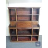 An antique mahogany and pine secretaire bookcase