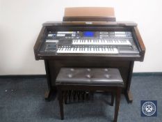 A Technics electric organ with stool