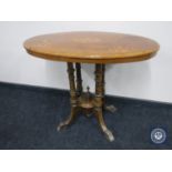 A Victorian inlaid mahogany pedestal occasional table