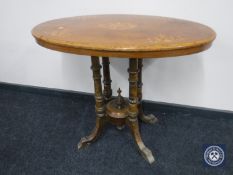 A Victorian inlaid mahogany pedestal occasional table