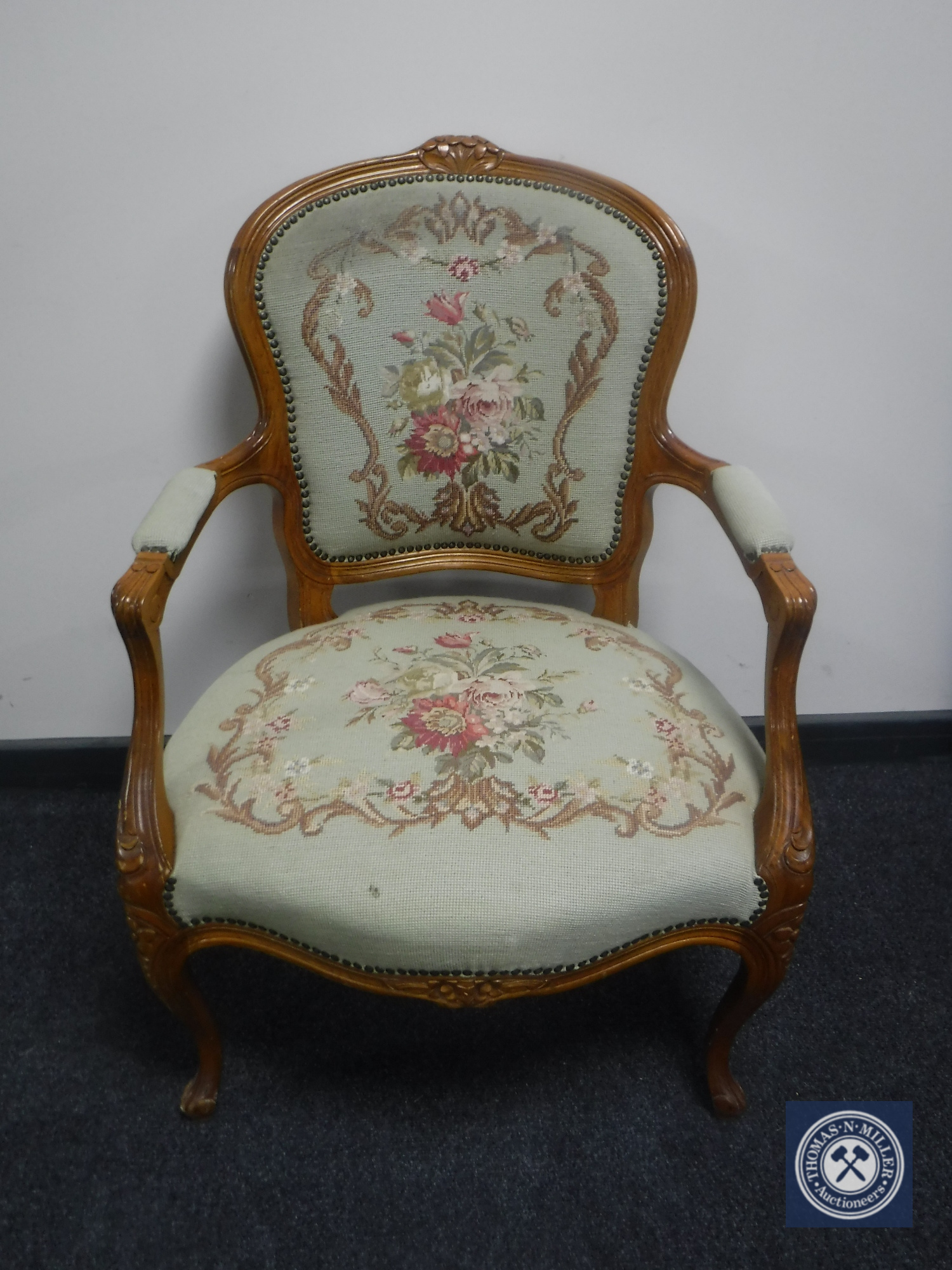 A continental salon armchair in tapestry fabric