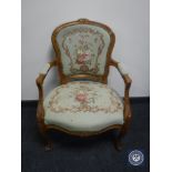 A continental salon armchair in tapestry fabric