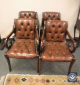A set of four Regency style brown buttoned leather armchairs CONDITION REPORT: