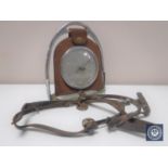 An early twentieth century 'stirrup' barometer and two small stirrups