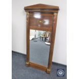 A continental mahogany hall mirror with gilt metal mounts