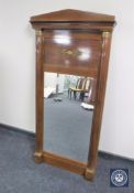 A continental mahogany hall mirror with gilt metal mounts