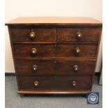 A Victorian mahogany five drawer chest,