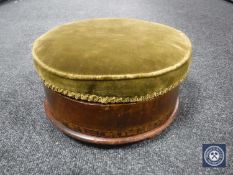 A circular inlaid mahogany sewing box/stool