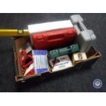A box containing electrical tools, spirit level, cased drill, electrical testing meter,
