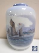 A Royal Copenhagen vase depicting boats in a harbour,