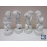 Four Bing & Grondahl figures of children in white glaze, height 11.