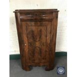 A late 19th century corner cupboard