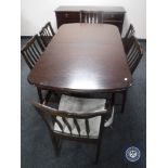 A Stag eight piece dining room suite comprising of sideboard,