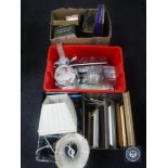 Four boxes containing tins, table lamp shades, china,