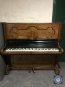 A continental walnut overstrung piano by Kiobenhavn