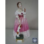 A Royal Doulton Queens of the Realm figure, Queen Victoria HN 3125,