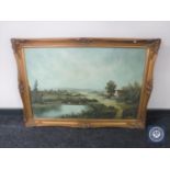 A gilt framed oil on canvas rural landscape