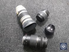 A Canon Ultrasonic EF 75 - 300mm zoom lens, together with a Canon EFS 15 - 55mm lens,