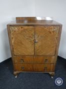 An early twentieth century inlaid walnut linen chest