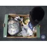 A box of assorted china, oriental wall plate and lidded box, glass decanter, two riding hats etc.