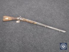 A nineteenth century percussion cap rifle