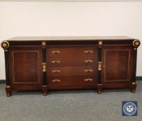 A fine quality Empire style sideboard, fitted with four drawers flanked by two cupboards,