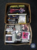 Two boxes of CD's together with a roll of posters including Beatles Hard Day's Night,