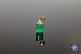 A 14ct yellow gold emerald and diamond pendant,